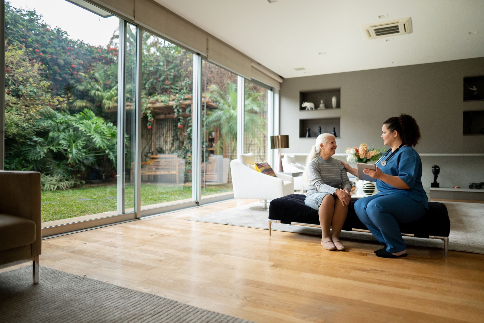 Senior Woman Talking to Nurse at Home — Sale, VIC — Madden Glass & Aluminium