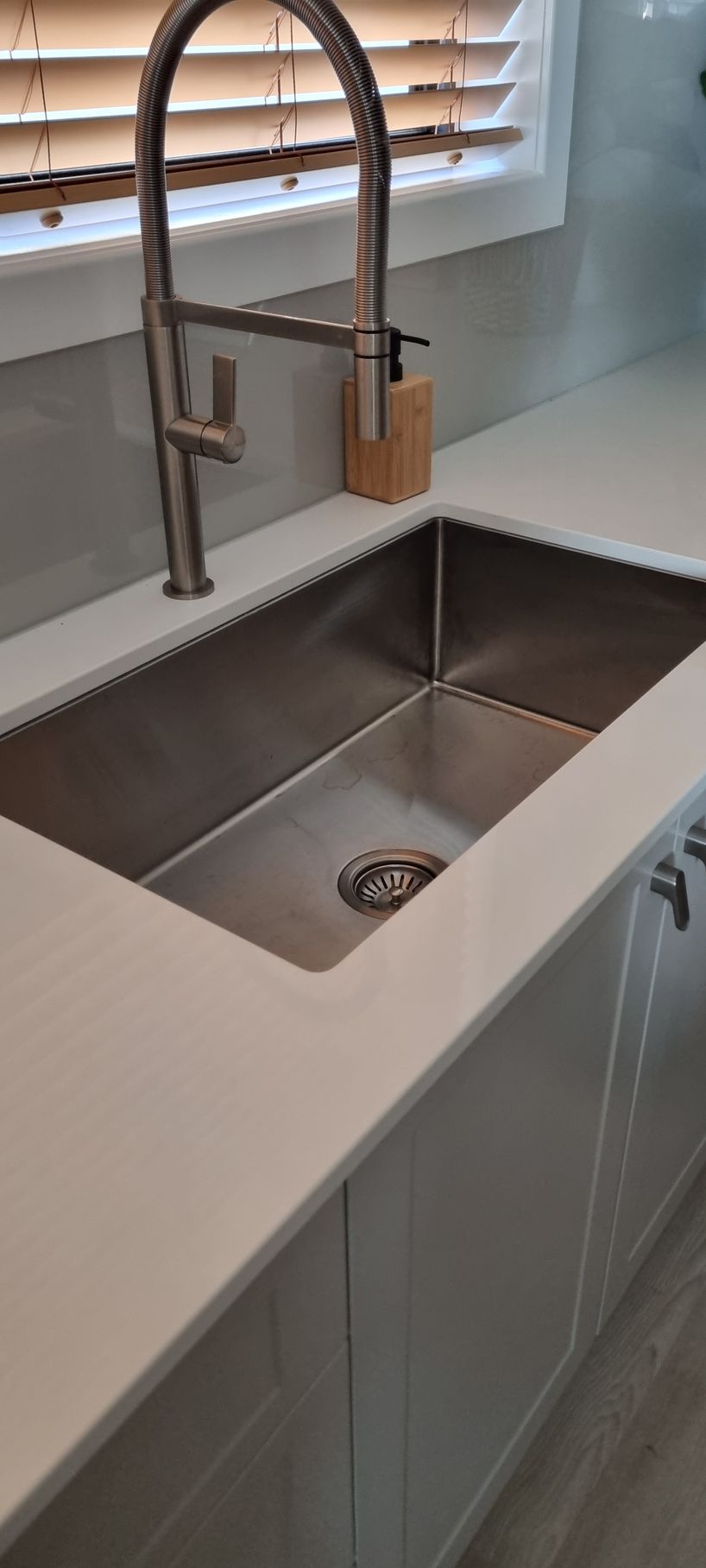 Stainless Steel Kitchen Sink With Faucet and Soap Dispenser — RWM Cleaning in Deception Bay, QLD