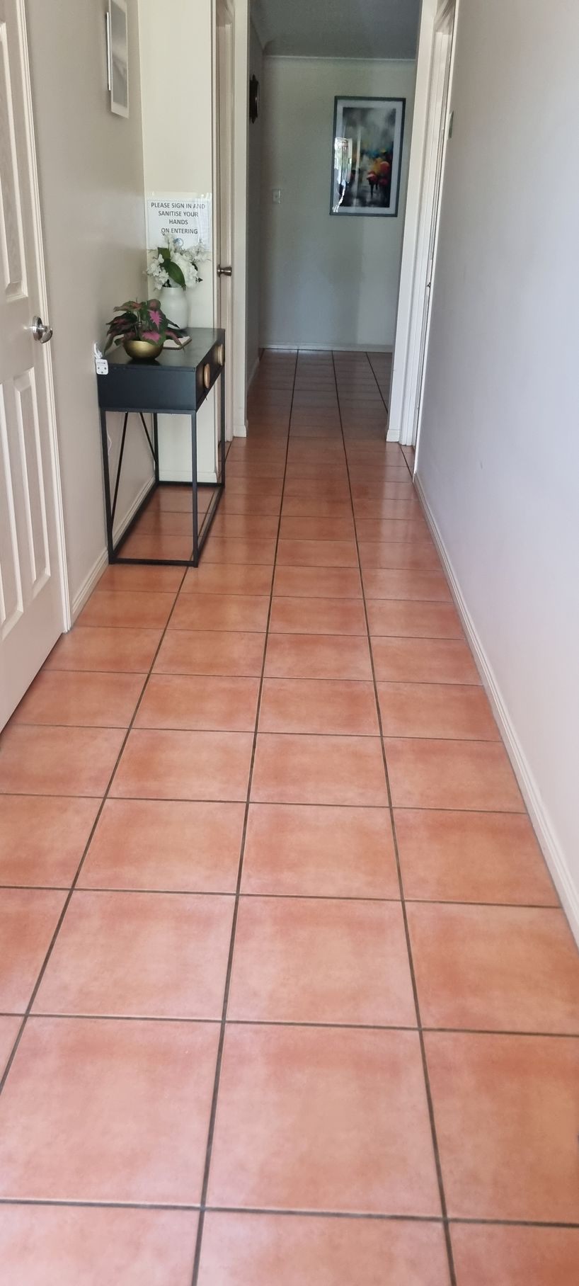 Hallway With Terracotta Tile Floor — RWM Cleaning in Deception Bay, QLD