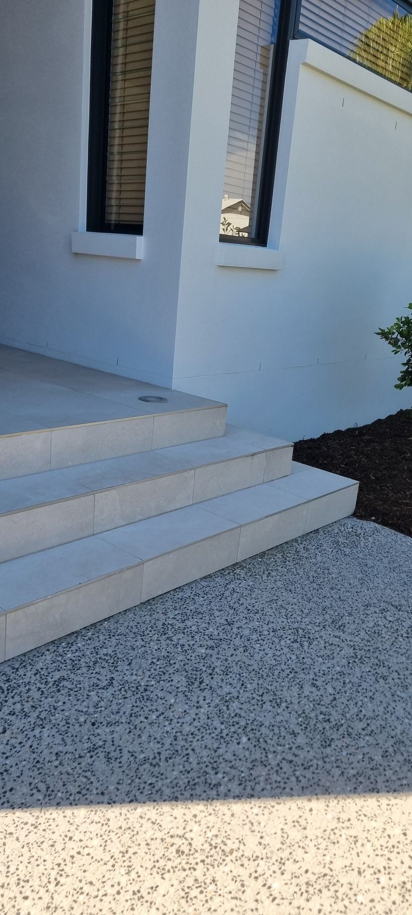Exterior of a Modern Home With White Walls — RWM Cleaning in Deception Bay, QLD