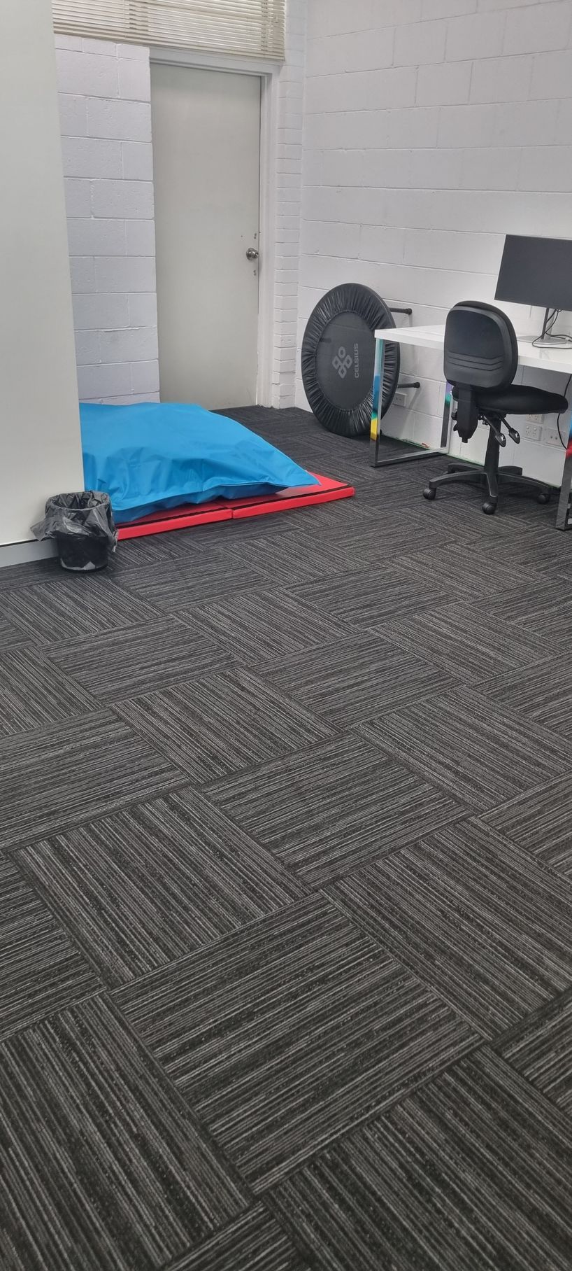 Office Space With Gray Patterned Carpet — RWM Cleaning in Deception Bay, QLD