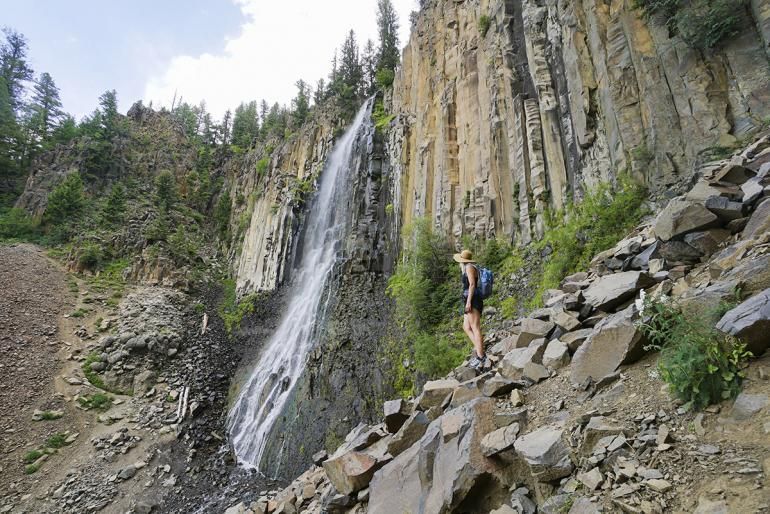 Photo of hiker at Hyalite Canyon / Palisade Falls.