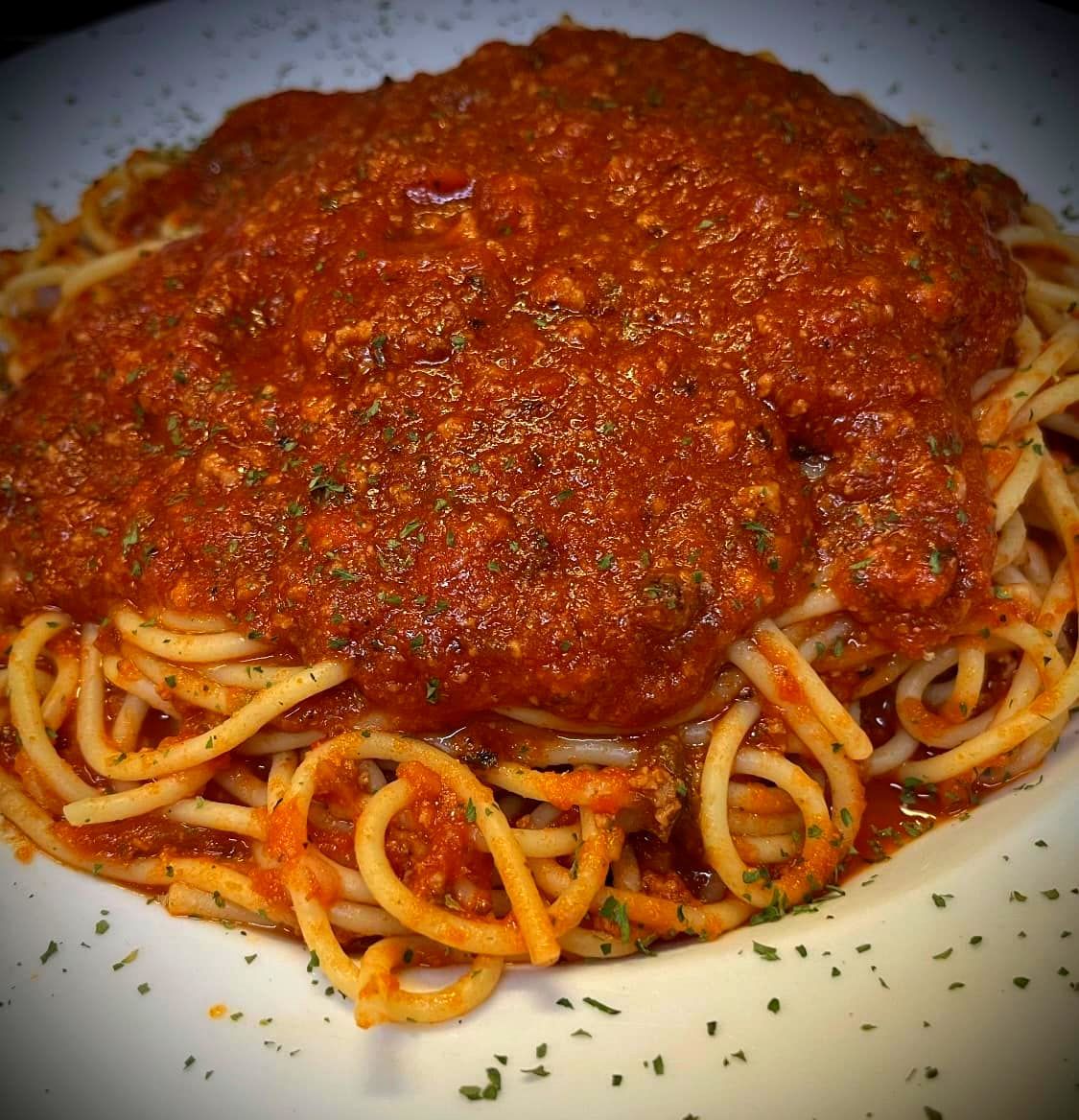 Various pizzas on trays