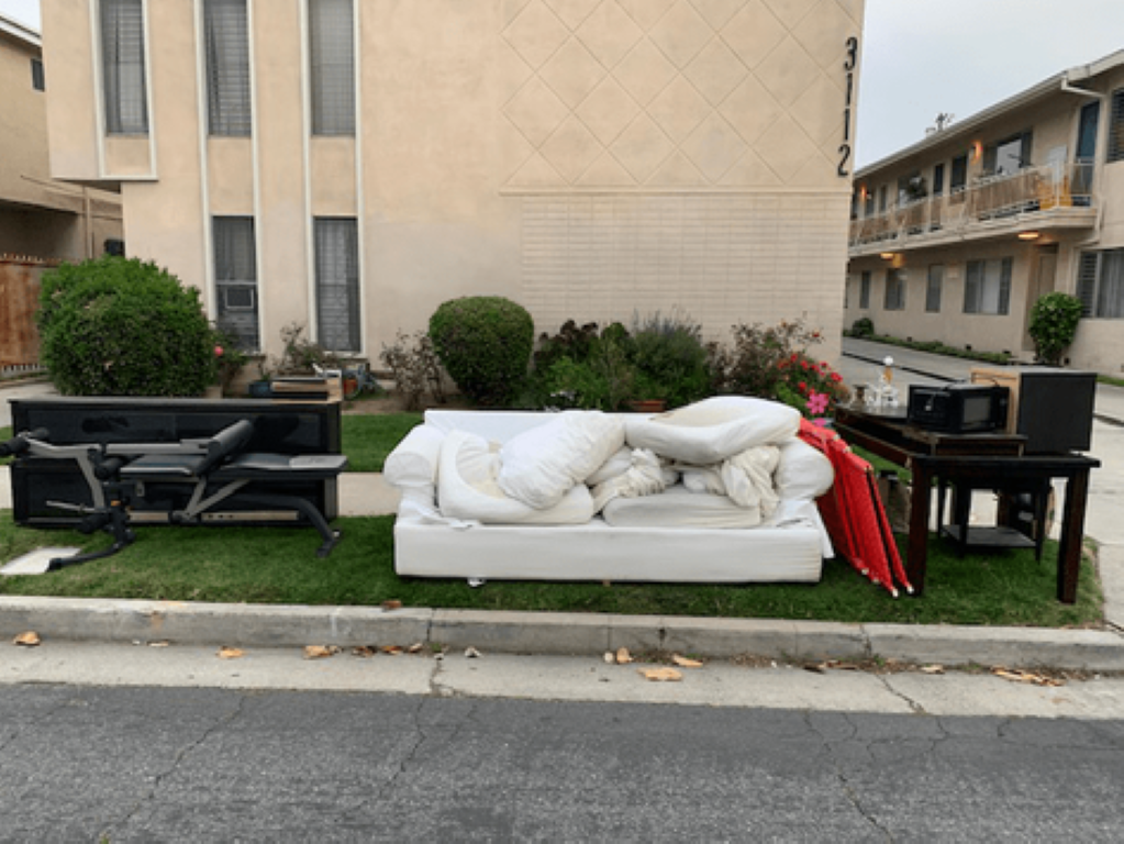 old couch left out in the snow