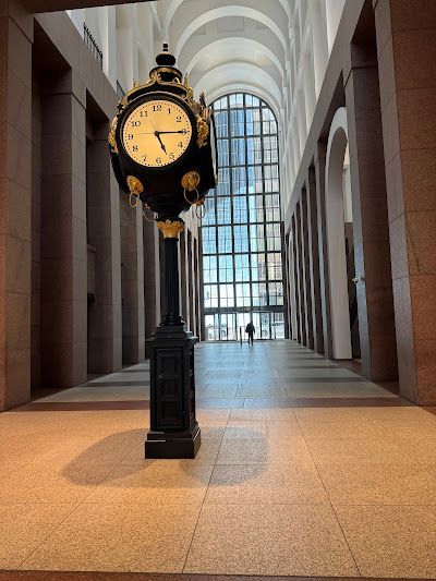 Water filtration system installed under a kitchen sink with a garbage disposal visible. Water filtration system installed under a kitchen sink with a garbage disposal visible.