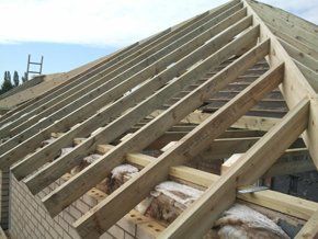 Wooden roof beams during roof installation