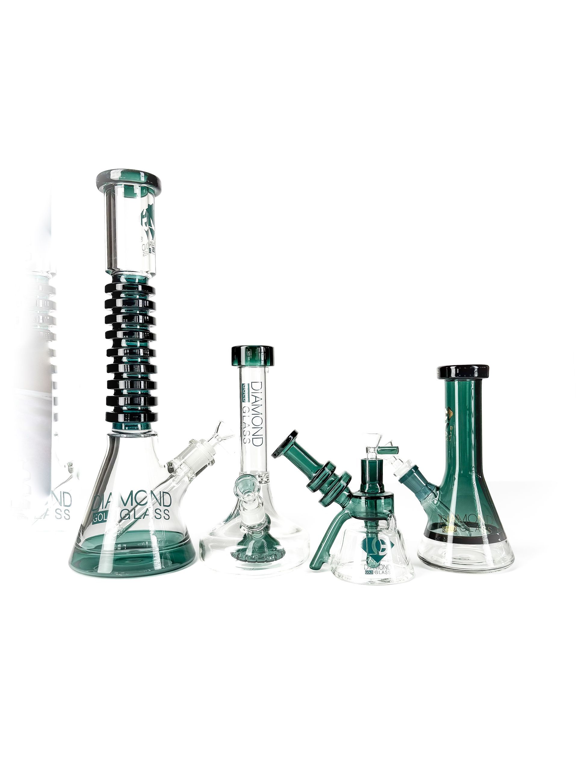 A wooden tray displays a variety of glass smoking pipes in assorted colors, textures, and patterns.