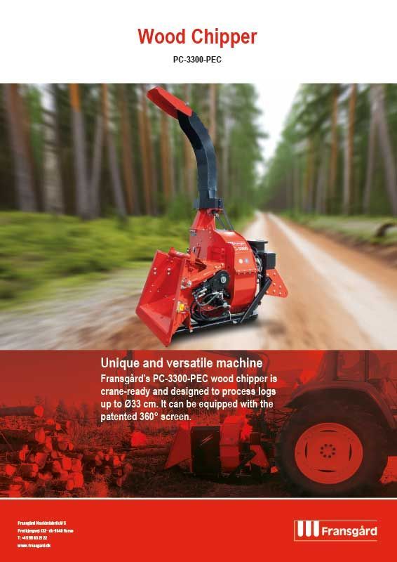 Red wood chipper in a forest setting