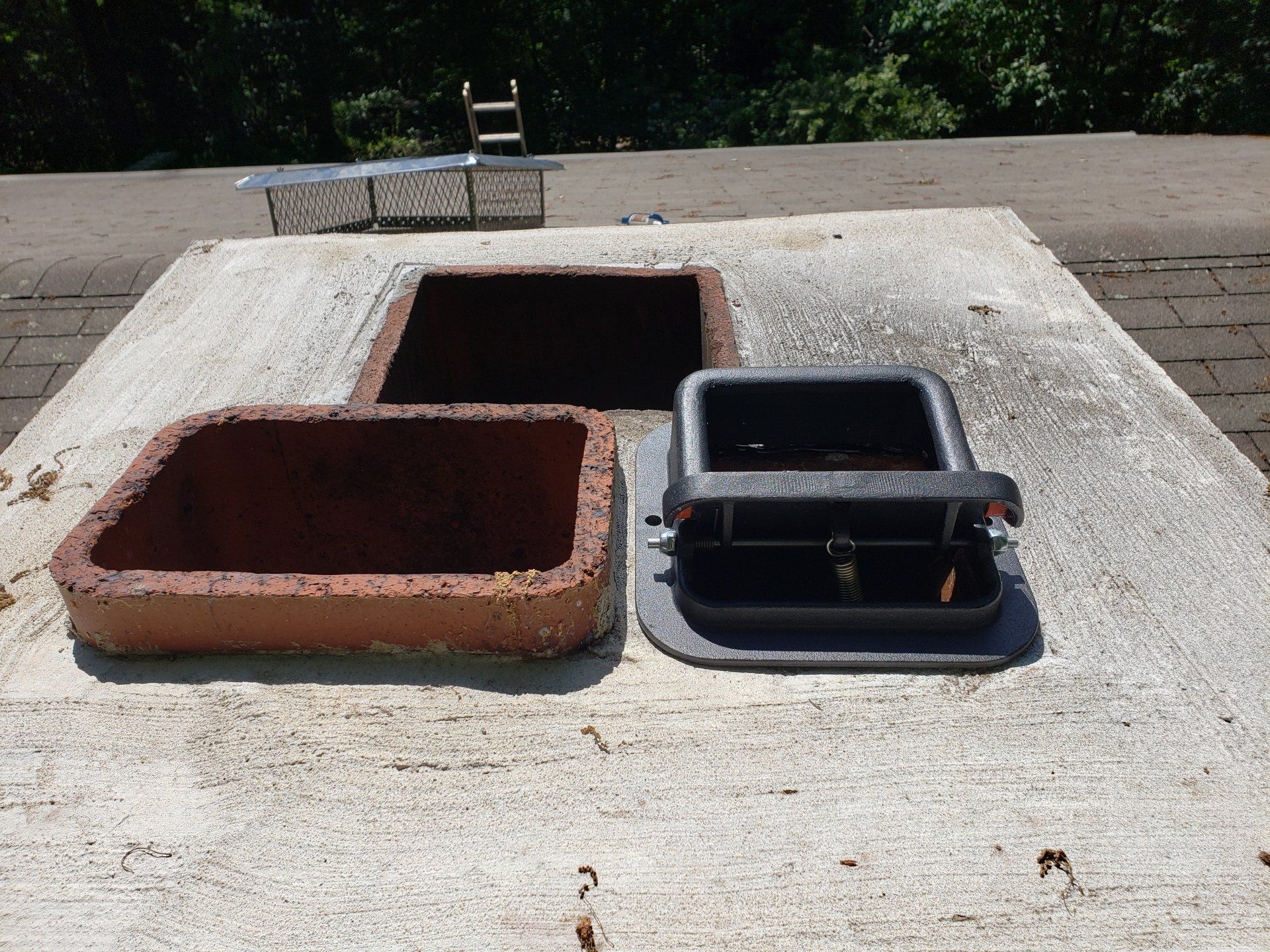 A concrete surface with a few holes in it