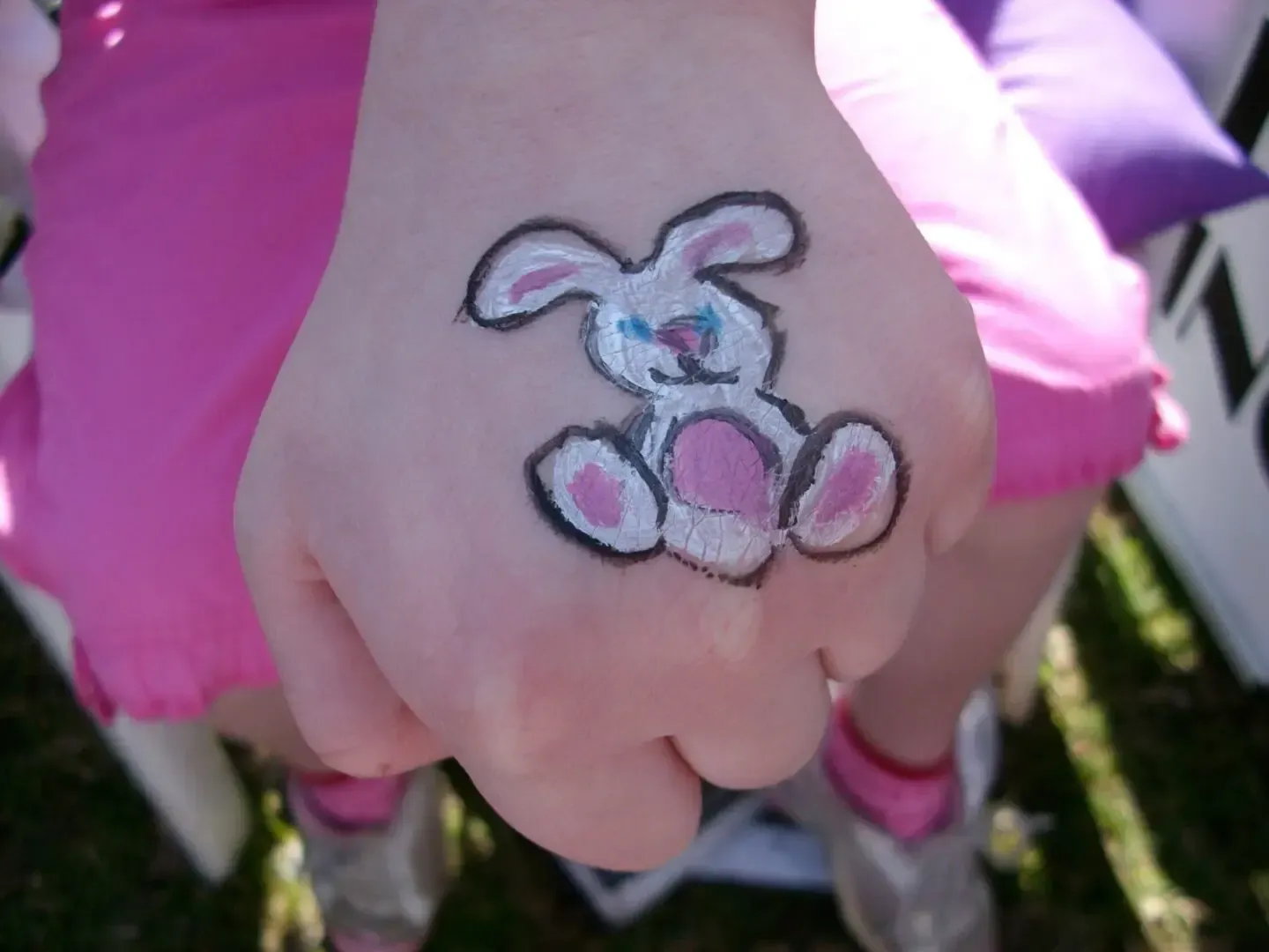 painted bunny on hand