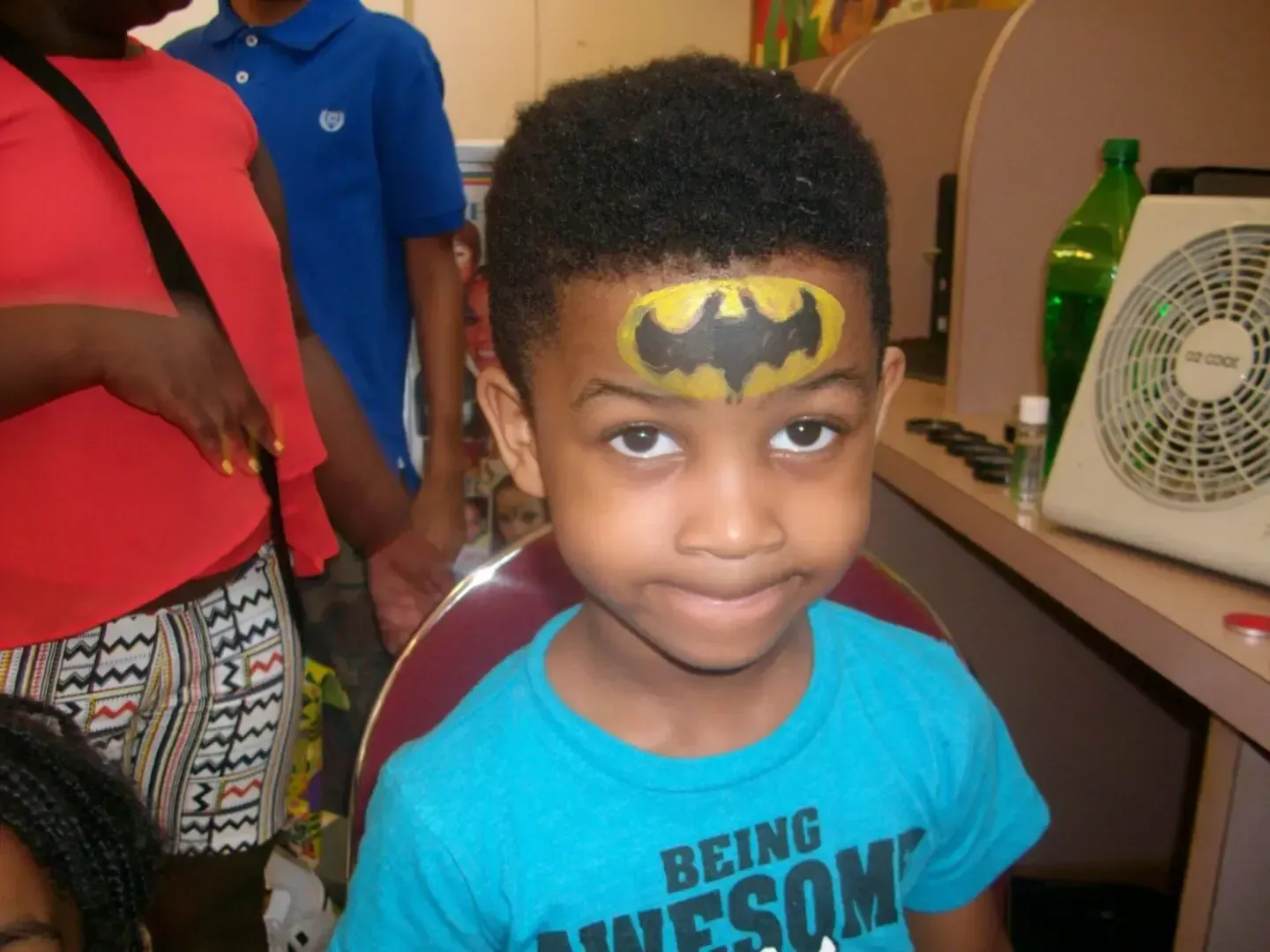 batman painted on kid forhead