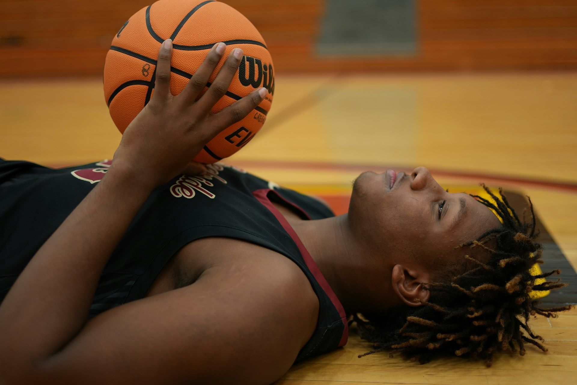 basketball player lying down