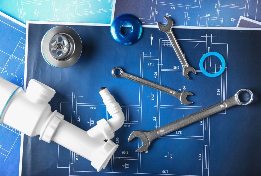 A Blueprint Of A Bathroom Sink With Pipes And Wrenches On It — Warrnambool Emergency Plumbing in Warrnambool, VIC