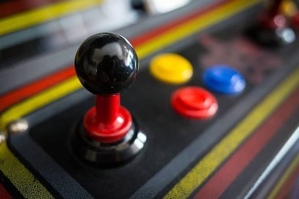 A close up of a video game controller with buttons on it.