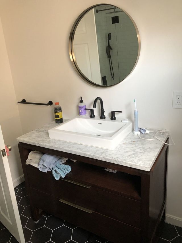 Bathroom with New Cabinet and Mirror — Philadelphia, PA — Family & Friends Builders LLC