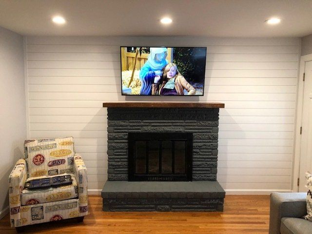 Black Fireplace — Philadelphia, PA — Family & Friends Builders LLC