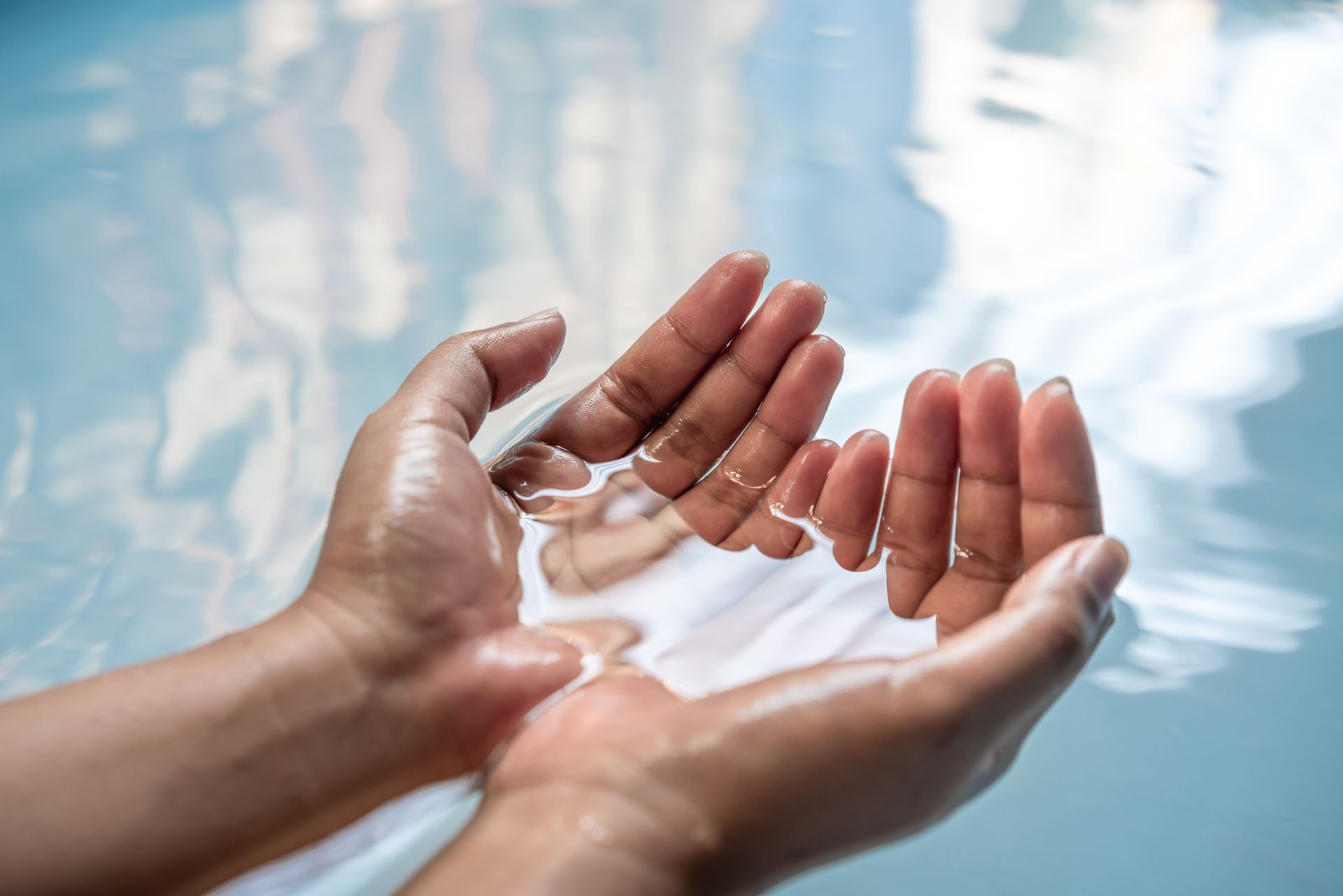 Hands Cupping Water