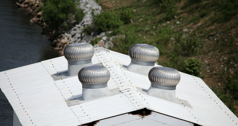 Four Silver Rotary Roof Vents on a White Metal Roof — Boostn Pty Ltd in Cooroy, QLD