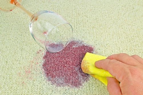 Professional cleaning a wine carpet stain in Sheridan, CO