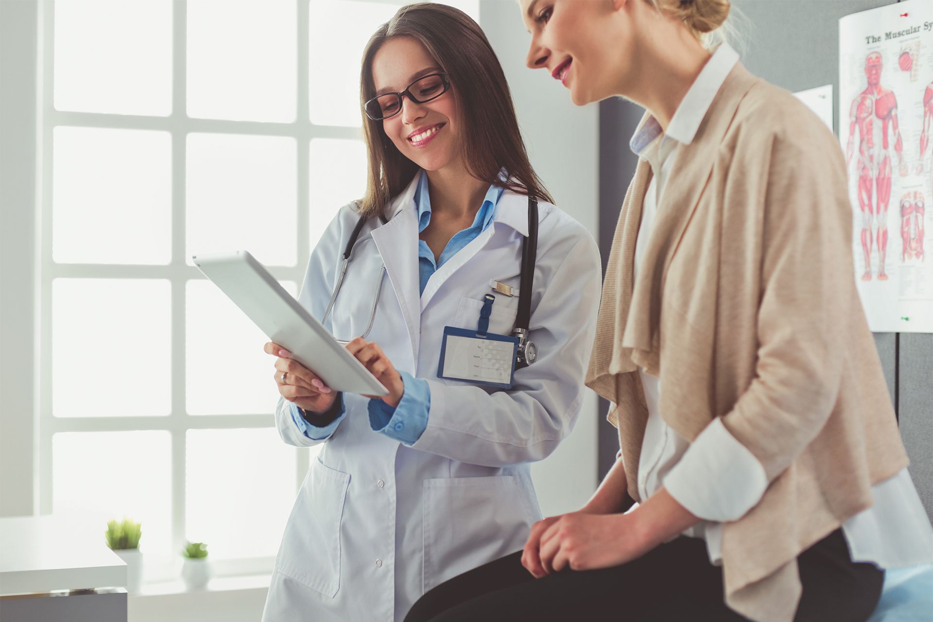 Female Doctor With Her Patient