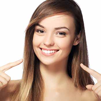 Pointing to teeth - Cleanings in Durant, OK