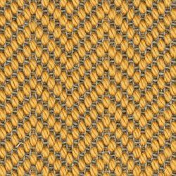 A close up of a yellow and grey rug with a honeycomb pattern.