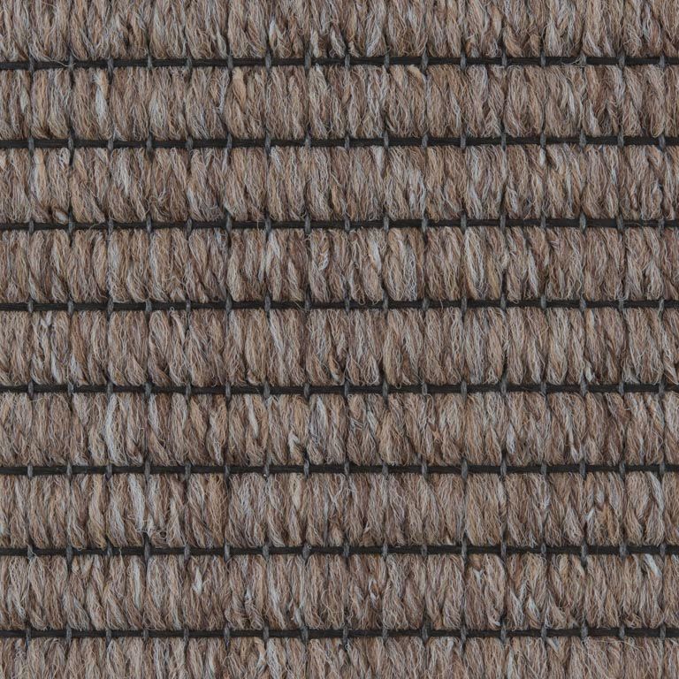 A close up of a carpet with a grid pattern