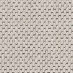 A close up of a white fabric with a pattern on it.