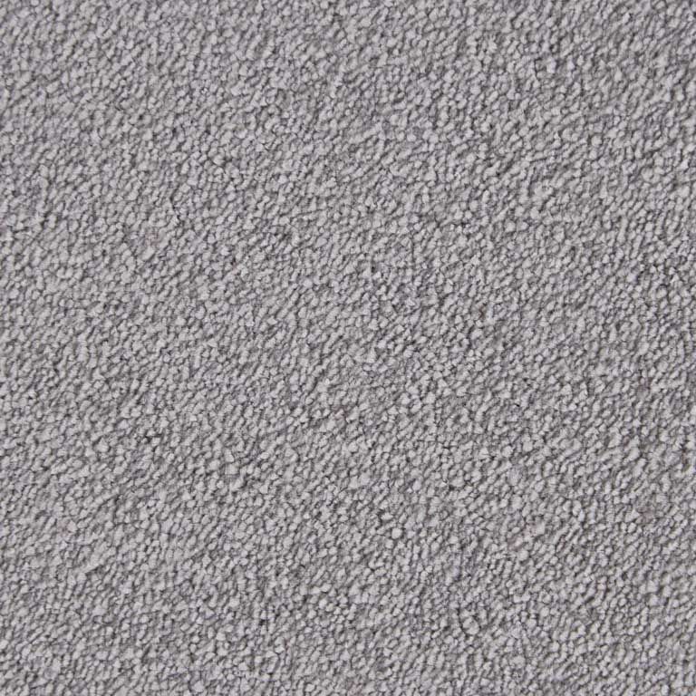 A close up of a gray carpet texture.