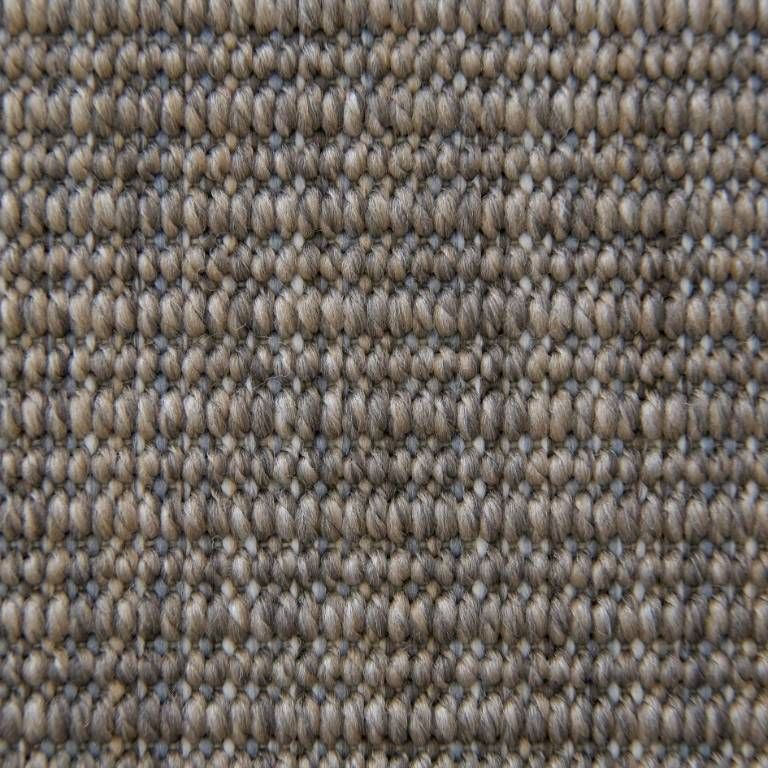 A close up of a piece of fabric with a knitted pattern.