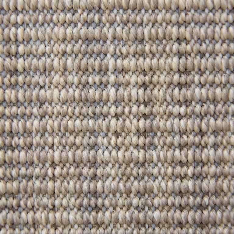 A close up of a knitted fabric texture.