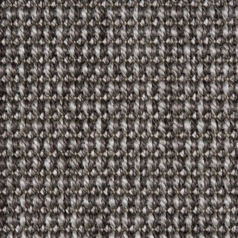 A close up of a gray and white fabric texture.