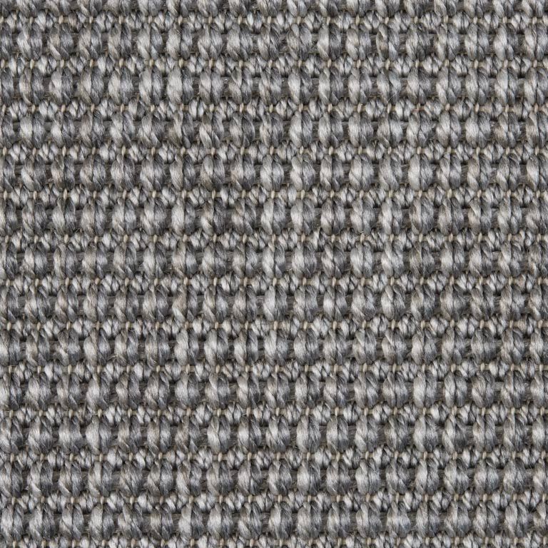 A close up of a gray carpet texture.