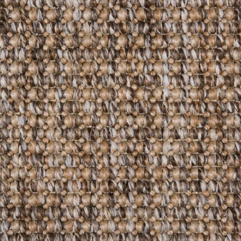 A close up of a brown and white carpet texture