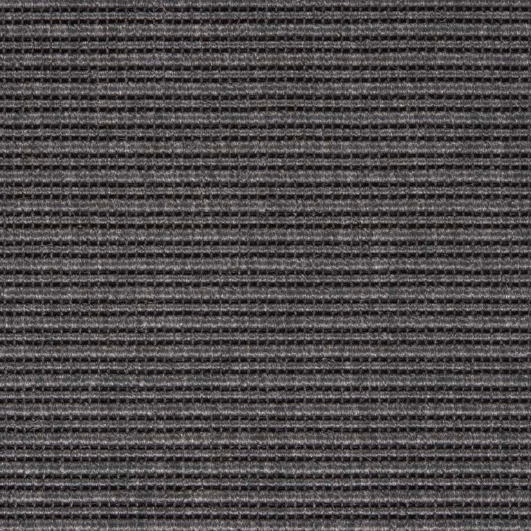 A close up of a gray carpet texture.