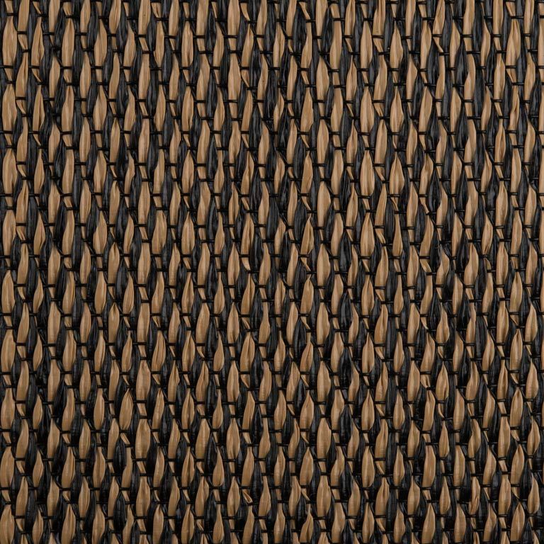 A close up of a brown and black rug with a geometric pattern.