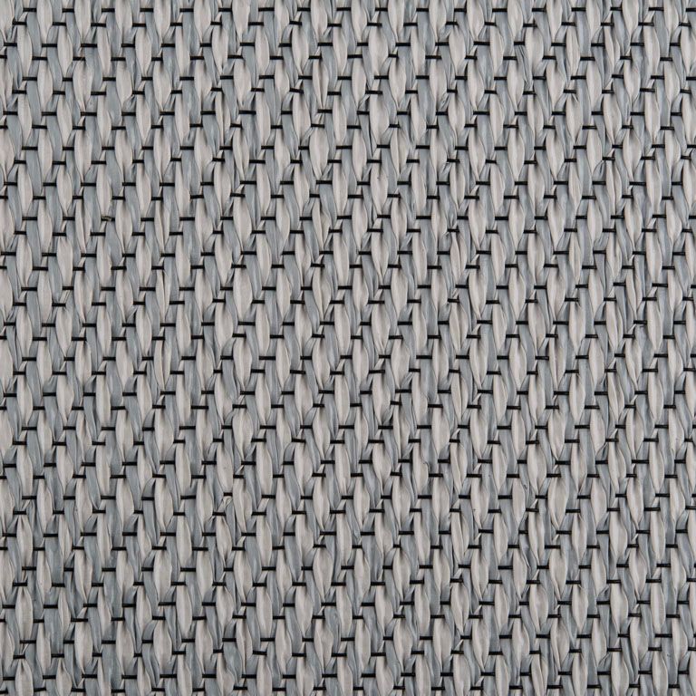 A close up of a gray and white fabric with a geometric pattern.