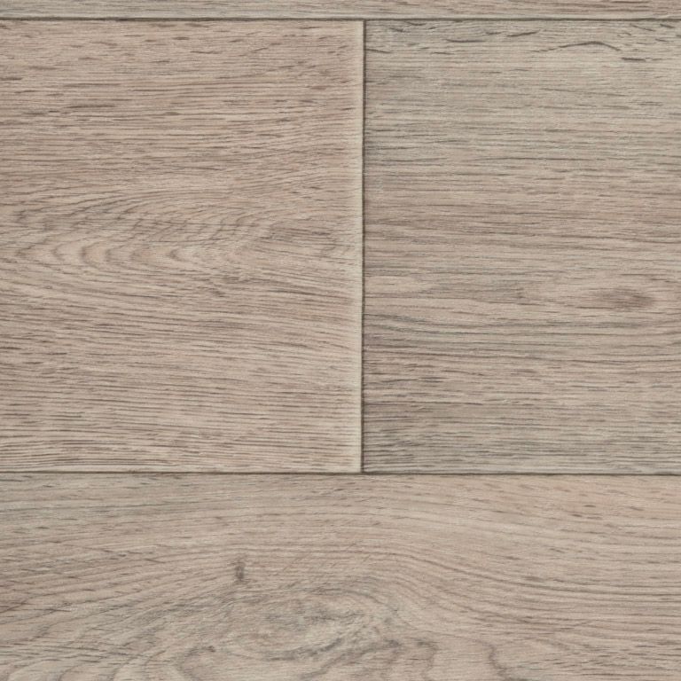 A close up of a wooden floor with a grainy texture.