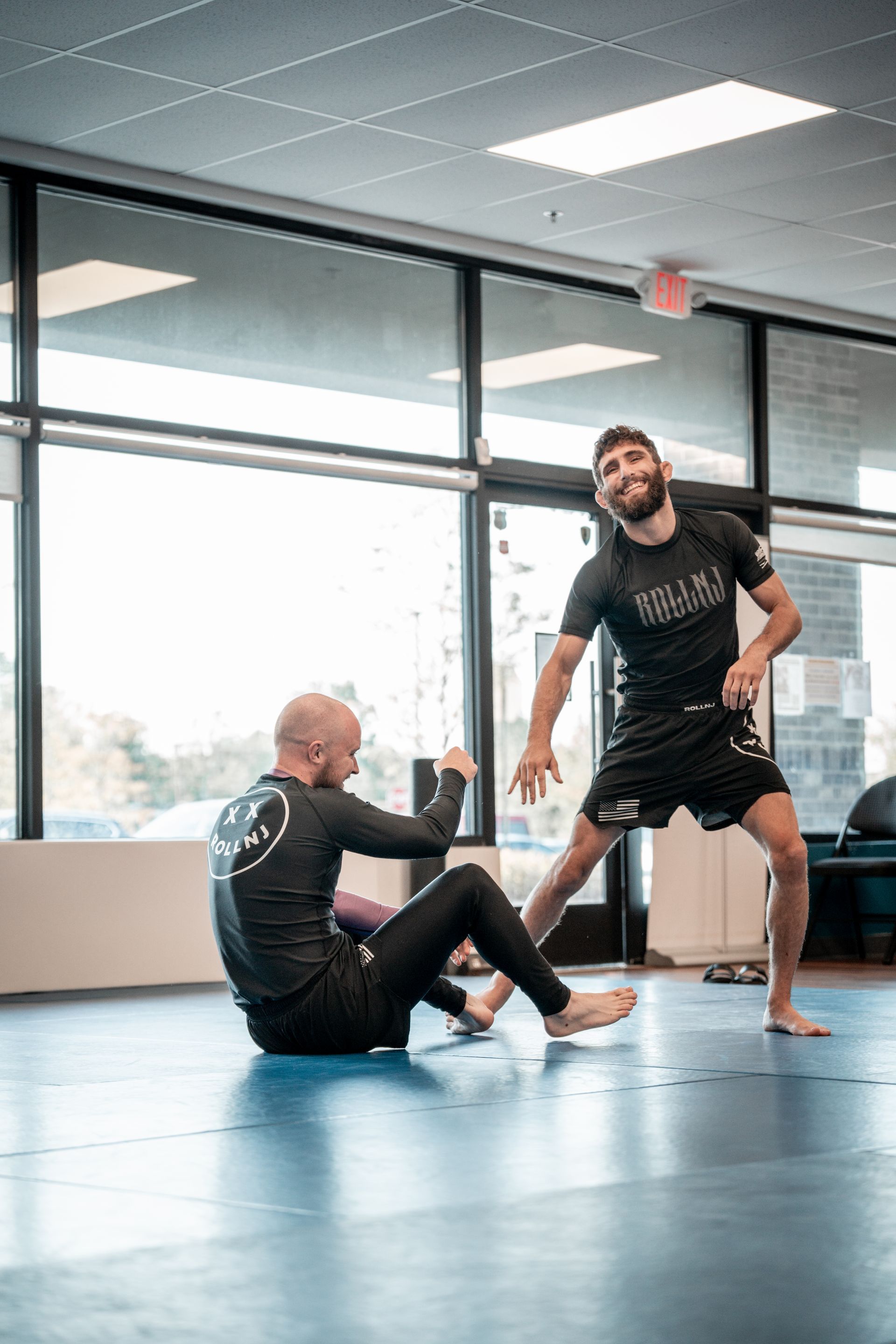 Adult students drilling guard retention at Montgomery Brazilian Jiu-Jitsu in Montgomery, NJ.