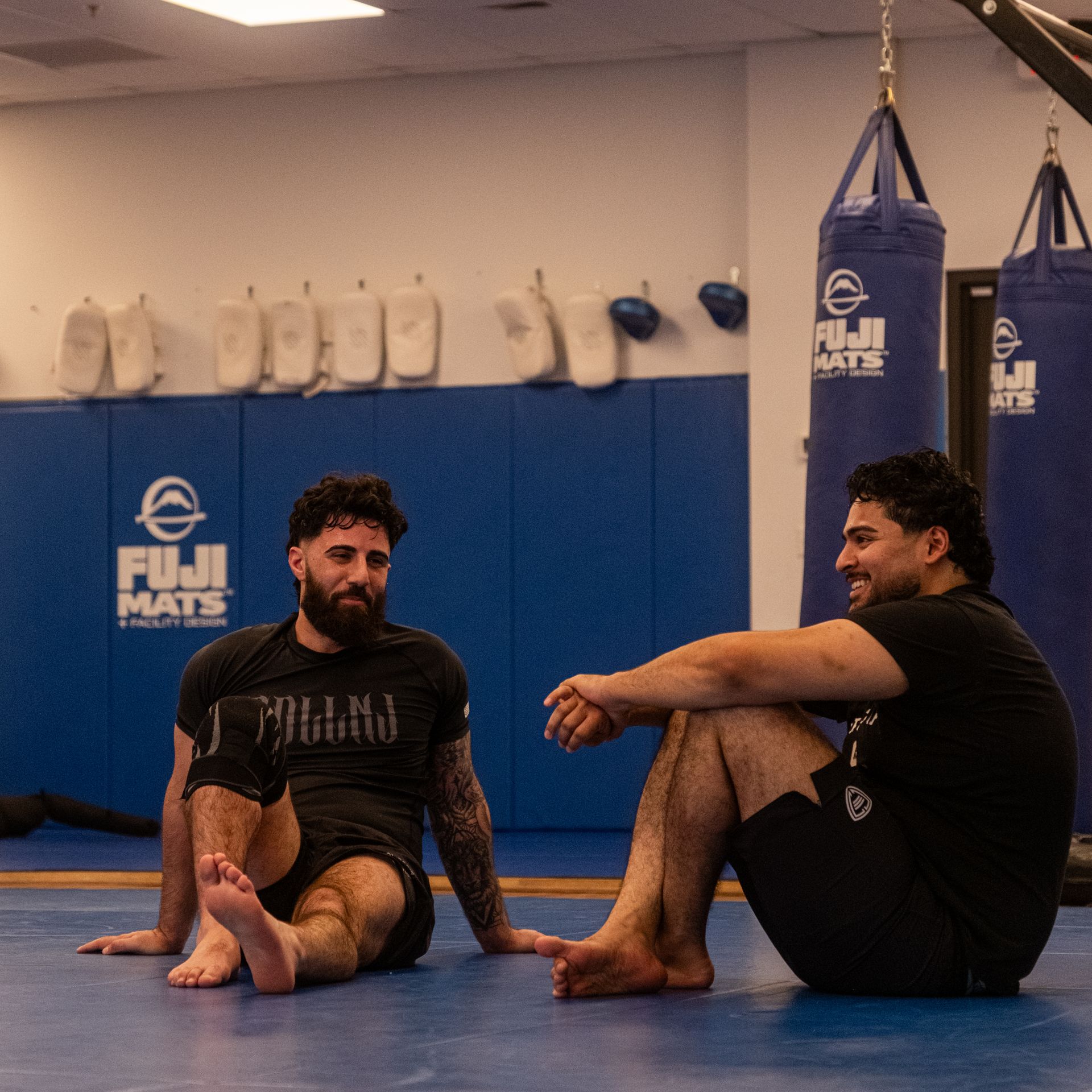 Student practicing shrimp and bridge home drills from Montgomery Brazilian Jiu-Jitsu in Montgomery.