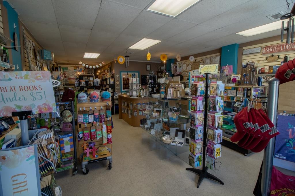 A store with a sign that says 'best books under $5.'