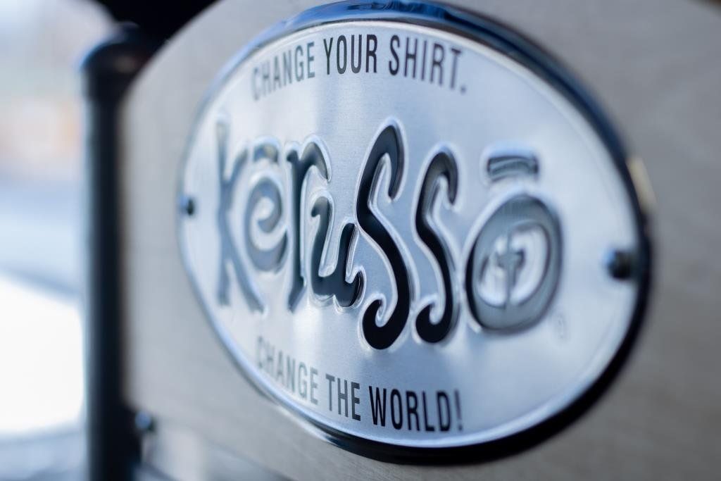 A sign that says 'Change your shirt. Change the world!'