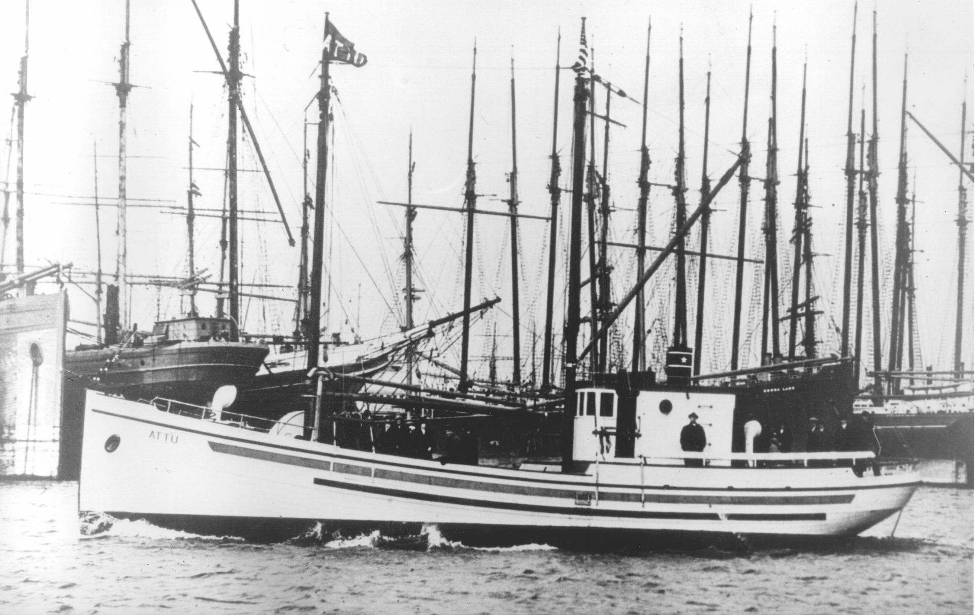 A black and white photo of a large ship in the water
