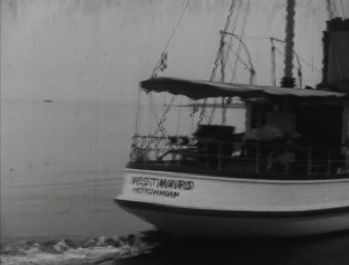 A black and white photo of a boat called westward