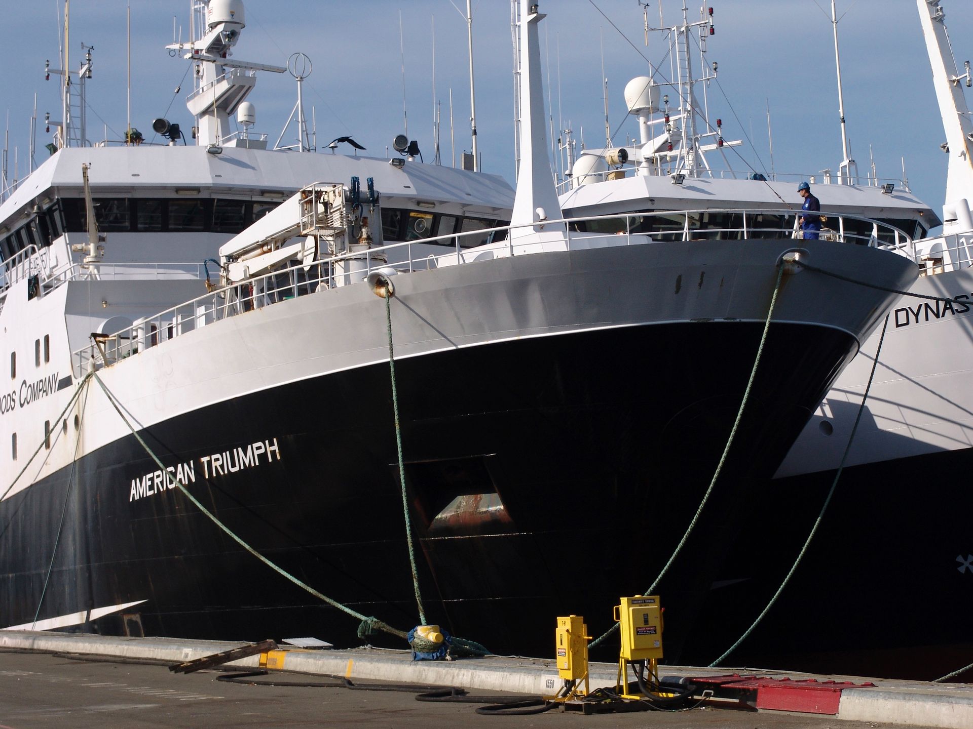 A large ship with the name american triumph on it