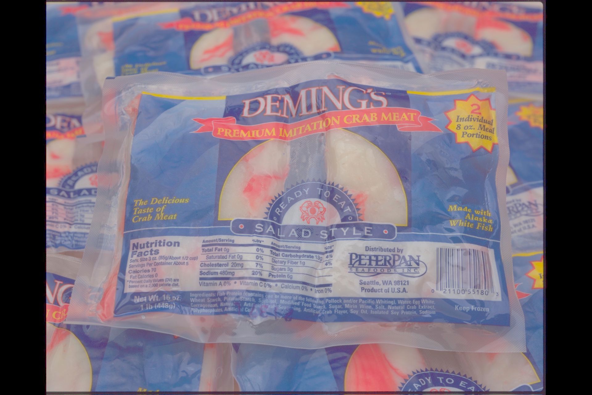 A bag of demings premium crab meat is sitting on a table.