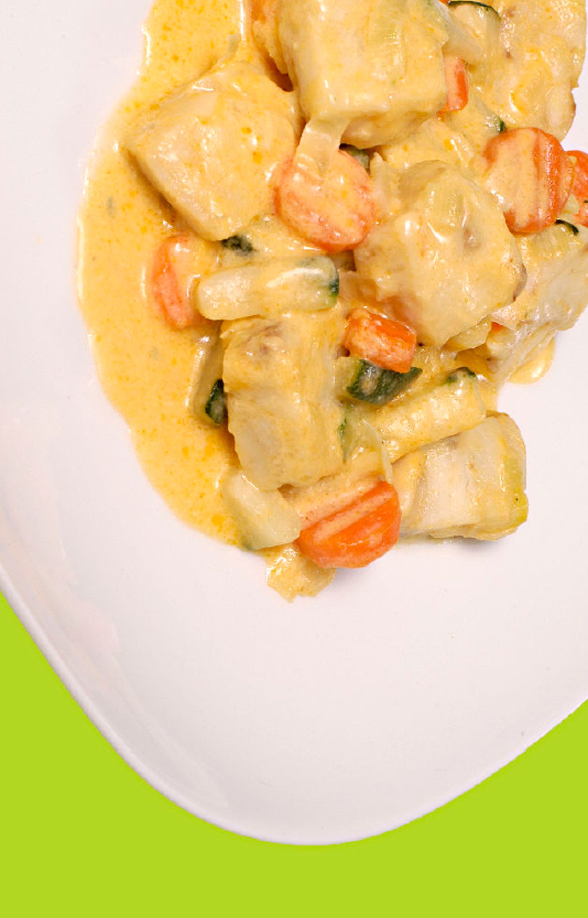 A close up of a plate of food on a green background.