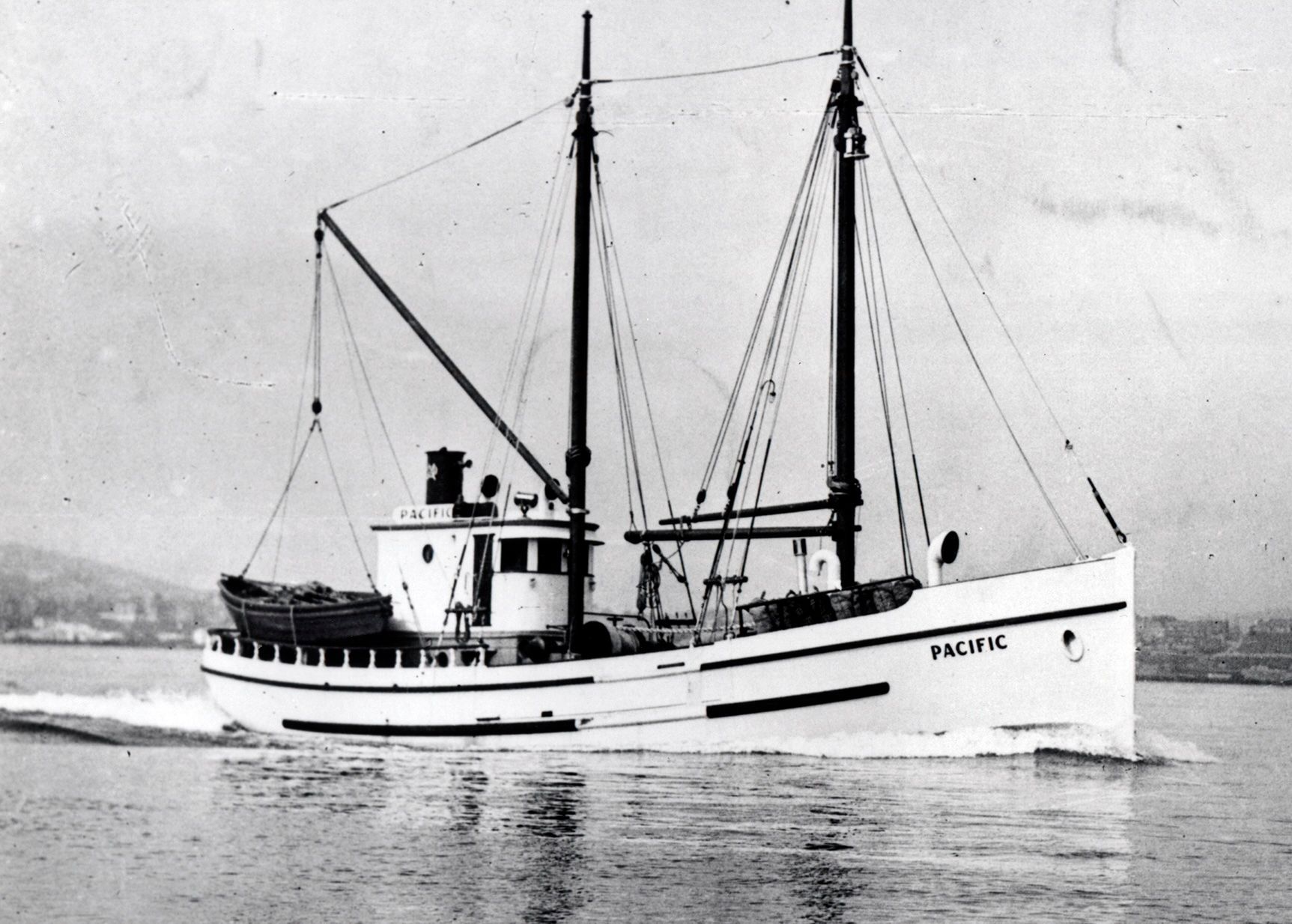 A black and white photo of a boat called pacific