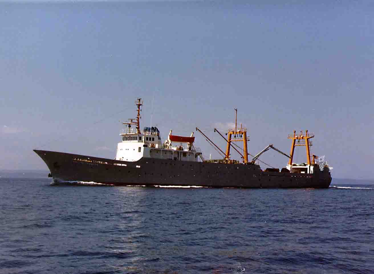 A large ship is in the middle of the ocean