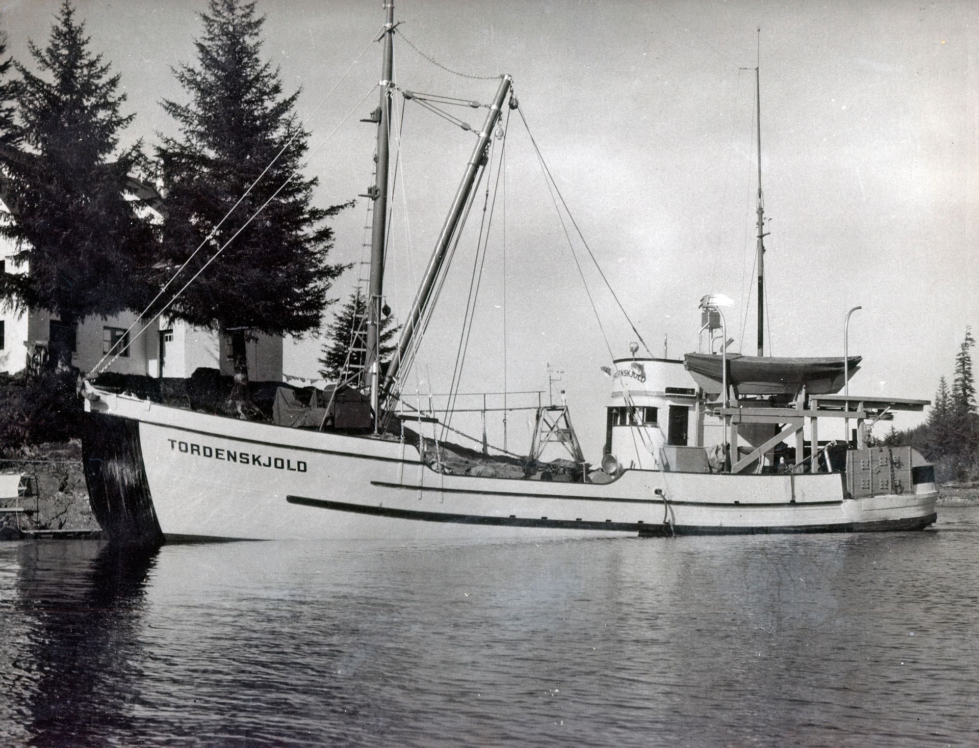 A black and white photo of a boat with the name springer juld on the side